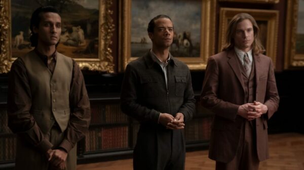 From L to R: Armand (Assad Zaman), Louis (Jacob Anderson) and Lestat (Sam Reid) stand in an art museum