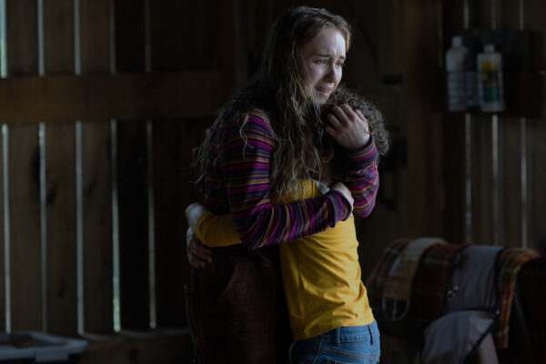 Meryl (Emilie Bierre) hugs Arlo (Caleb Dolden)